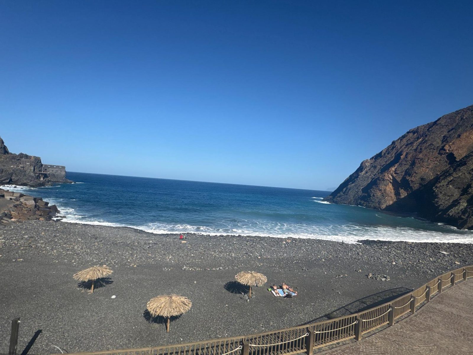 the caves above the black volcanic shore at Playa de las Arenas, Valle Gran Rey
